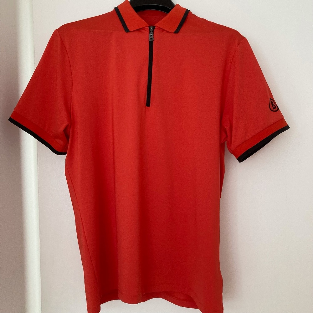 Bogner men's Cody functional short-sleeved polo in orange with black detailing a